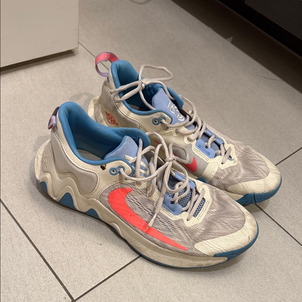 Nike Sneakers with Pink and Blue Highlights